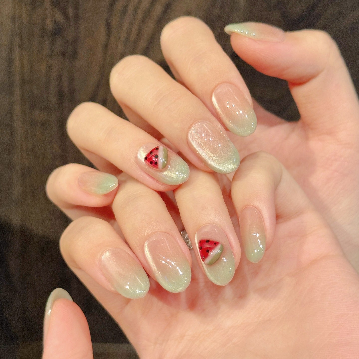 Watermelon Fairy style nail polish wearing nail pads